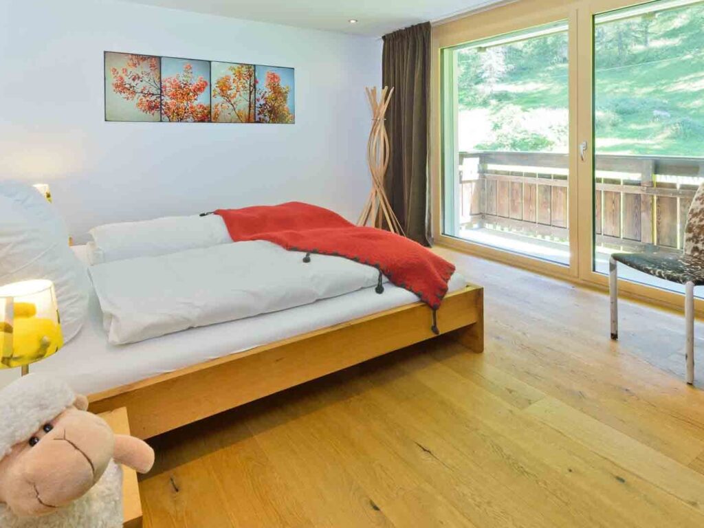 Main bedroom with balcony access